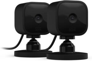 Blink Mini - Compact indoor plug-in smart security camera, 1080p HD video, night vision, motion detection, two-way audio, easy set up, Works with Alexa – 2 cameras (Black)