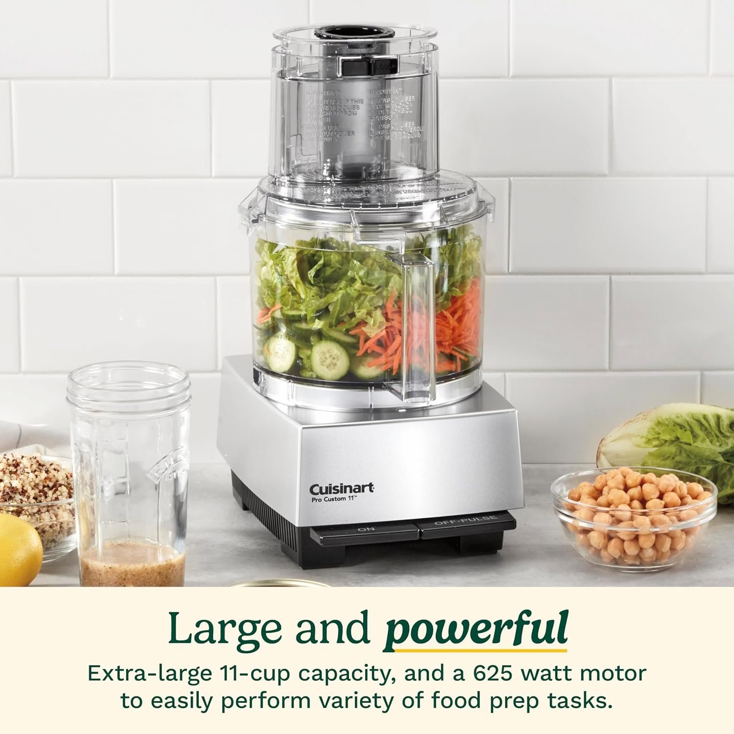 Cuisinart food processor beside fresh vegetables in a modern kitchen