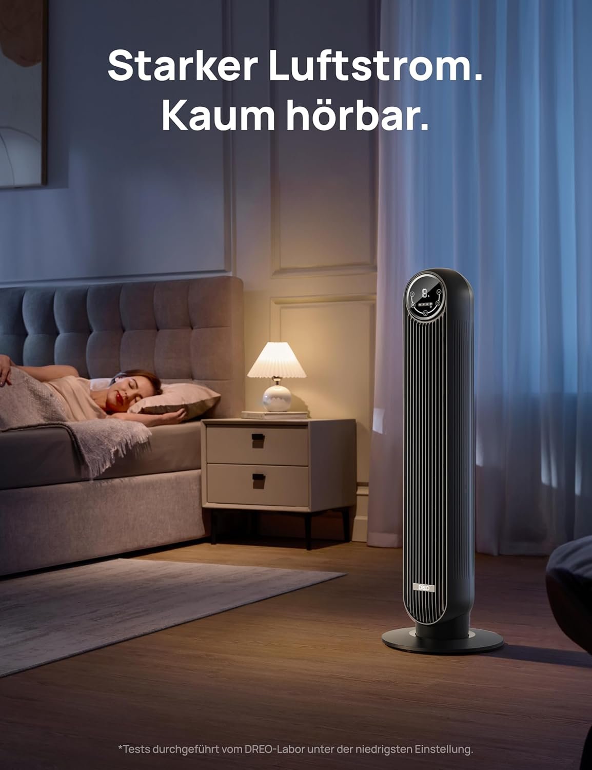 DREO Quiet Tower Fan beside a modern home office desk