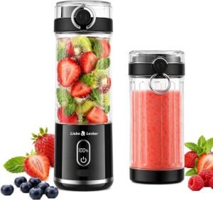 Black cordless portable blender bottle with LCD display on a kitchen counter