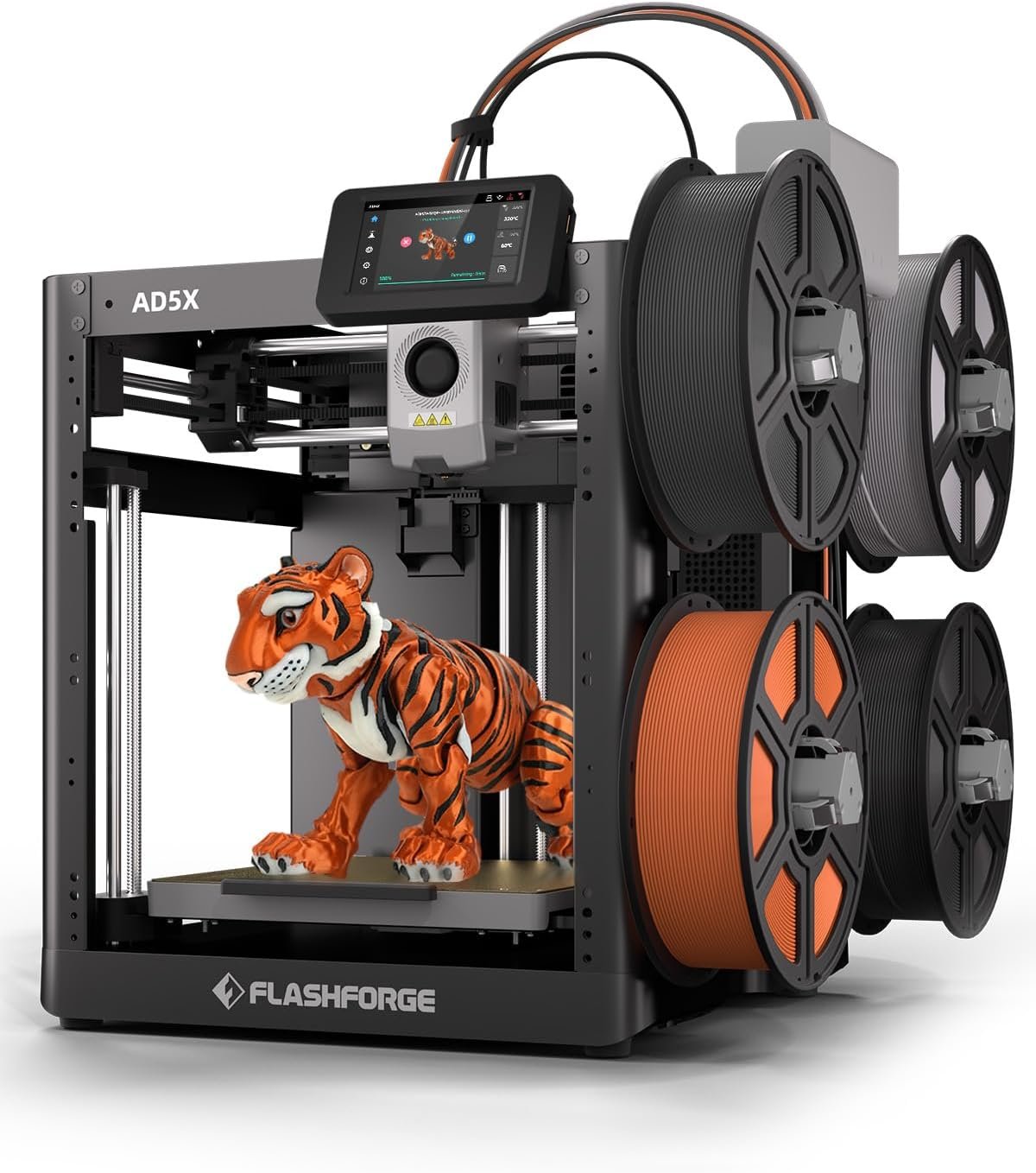 Multi-color 3D printer sitting on a home office desk printing a small organizer