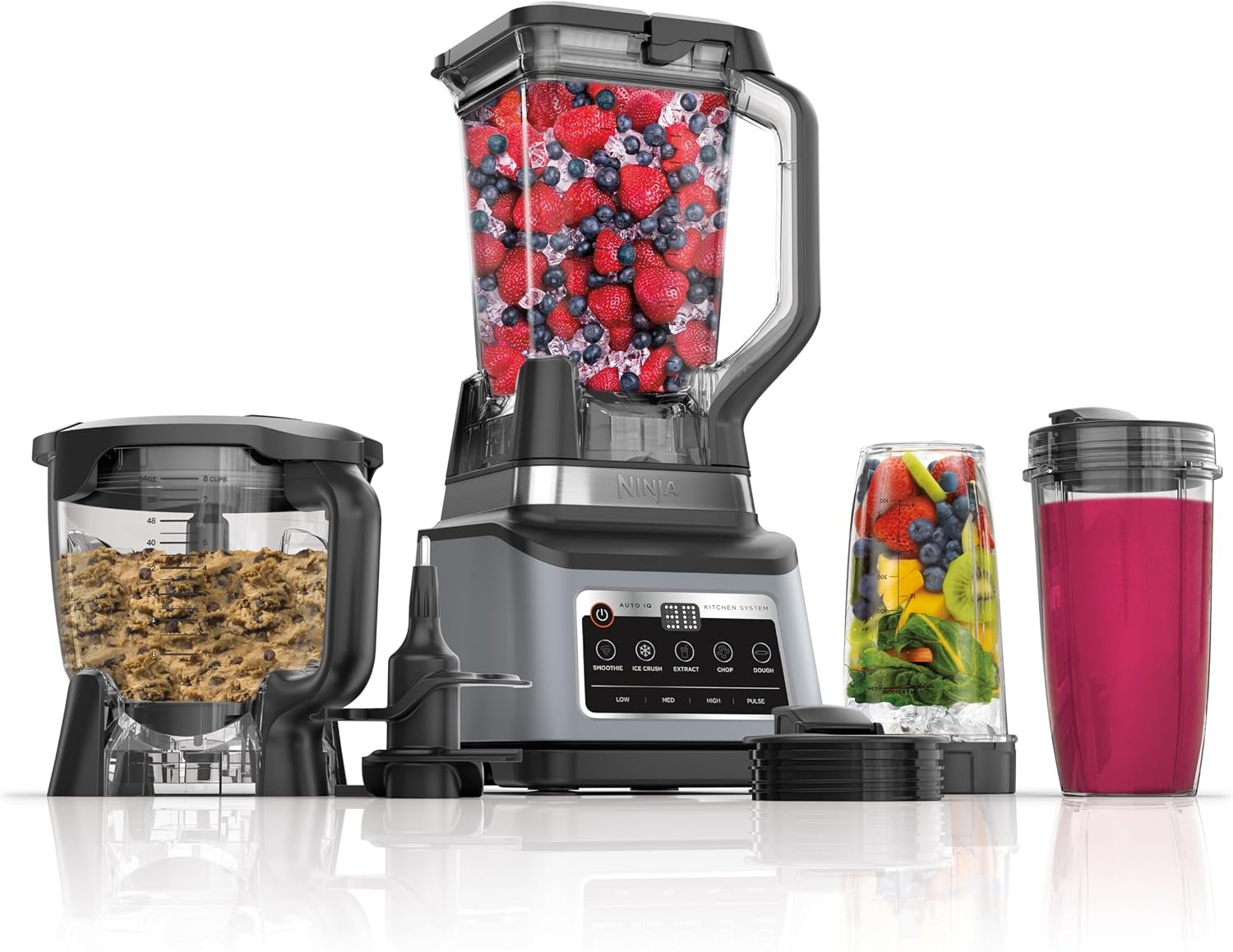 Ninja Professional Plus Kitchen System on a kitchen counter with blender pitcher and single-serve cups