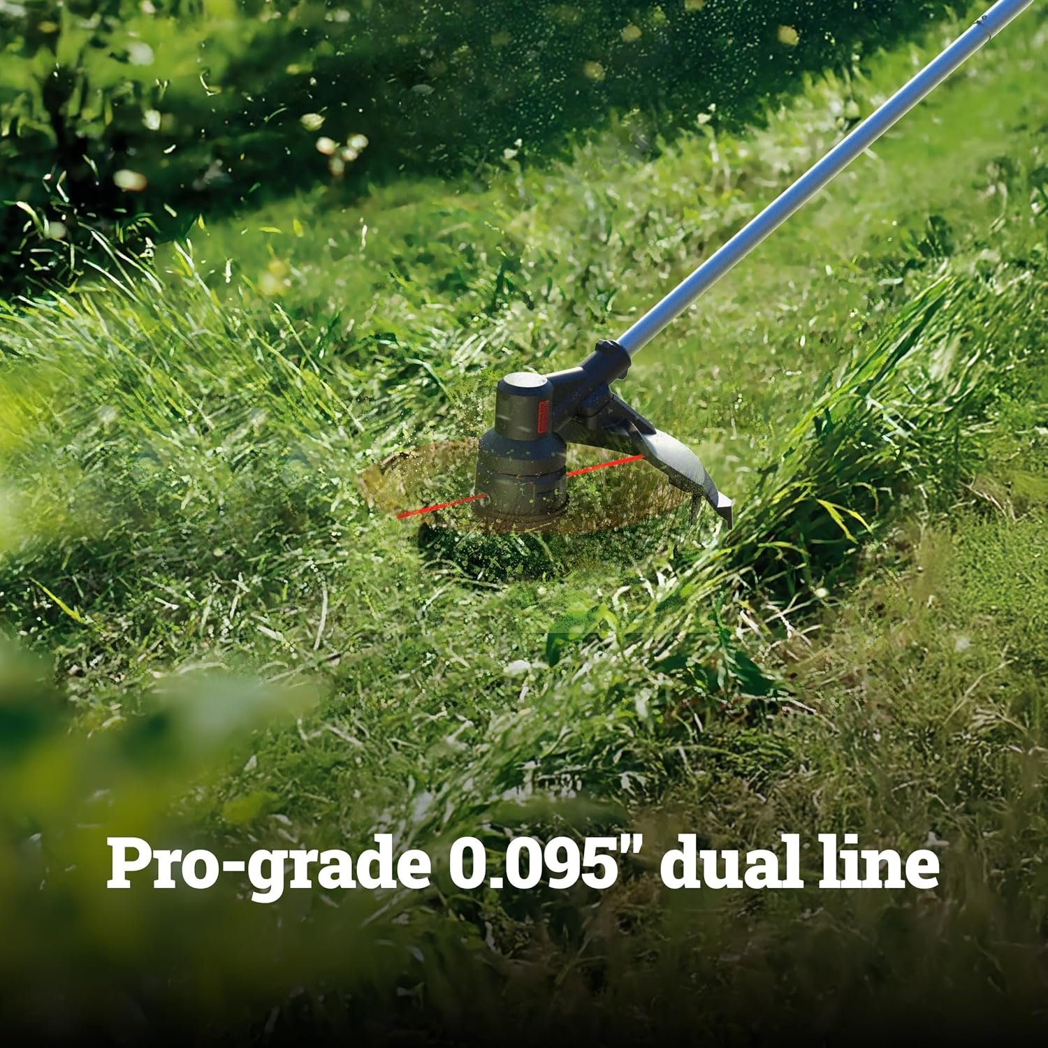 A sleek, black and orange Worx cordless string trimmer leaning against a sunlit wooden fence, surrounded by freshly cut grass.